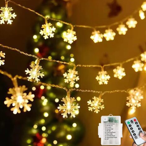 Waterproof Fairy Lights: 7M 60LEDs, Battery Powered, 8 Modes, Snowflake design. Perfect for any occasion.