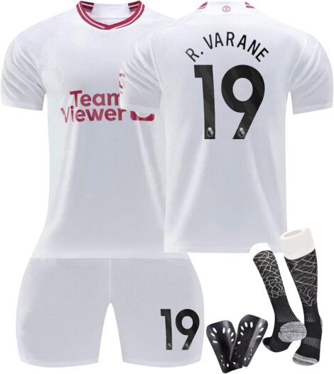 Customizable soccer jersey set with shirts, shorts, socks, and knee pads for kids and adults.