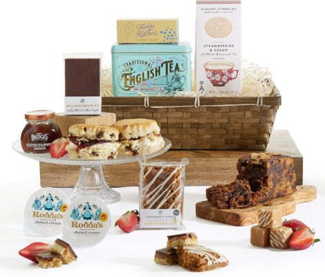 Clearwater Hampers’ Elegant Afternoon Tea Hamper: Delectable treats for couples and women, featuring scones, cream, jam, tea, biscuits, fruit cake, fudge, and flapjack.